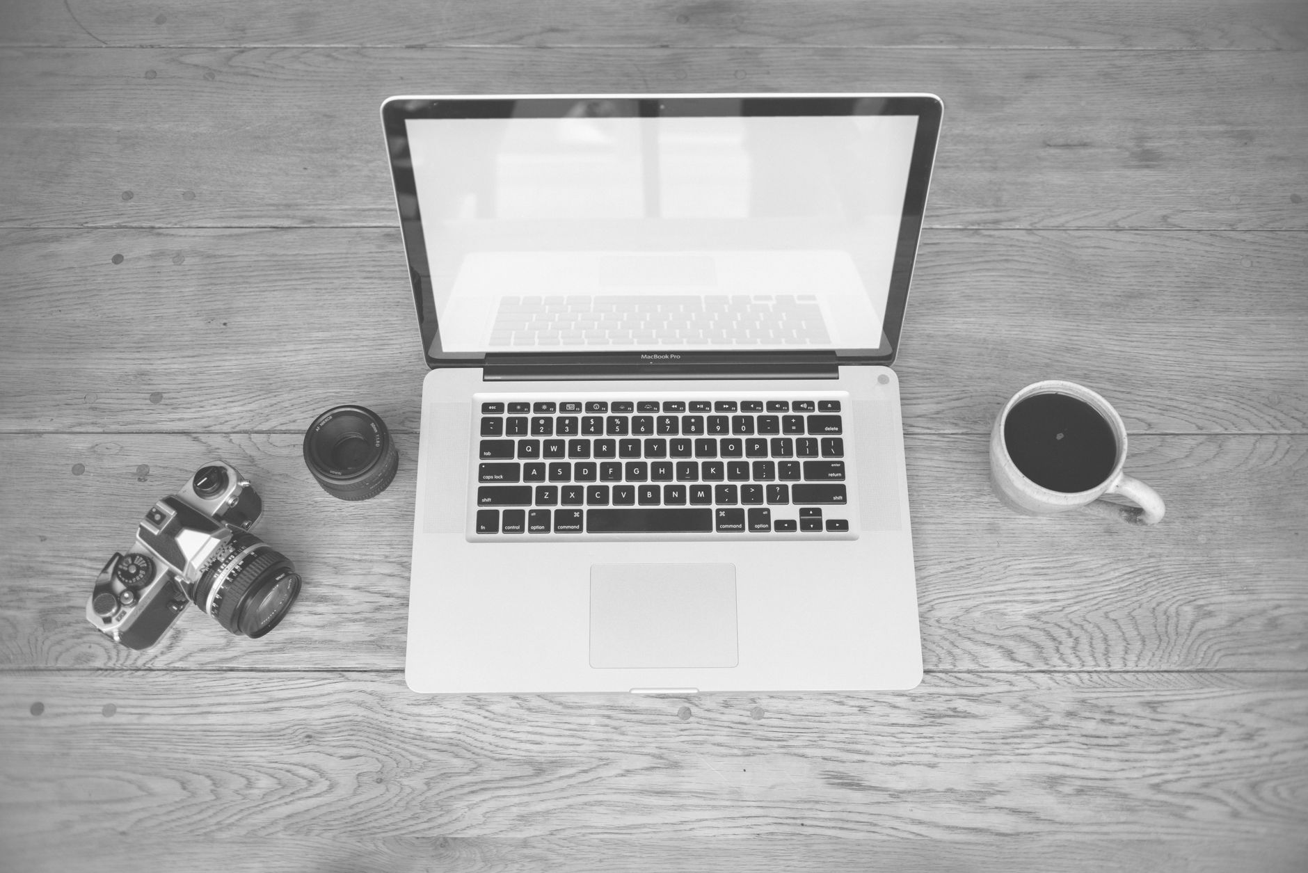 A laptop open on a desk representing an AI resume builder workspace