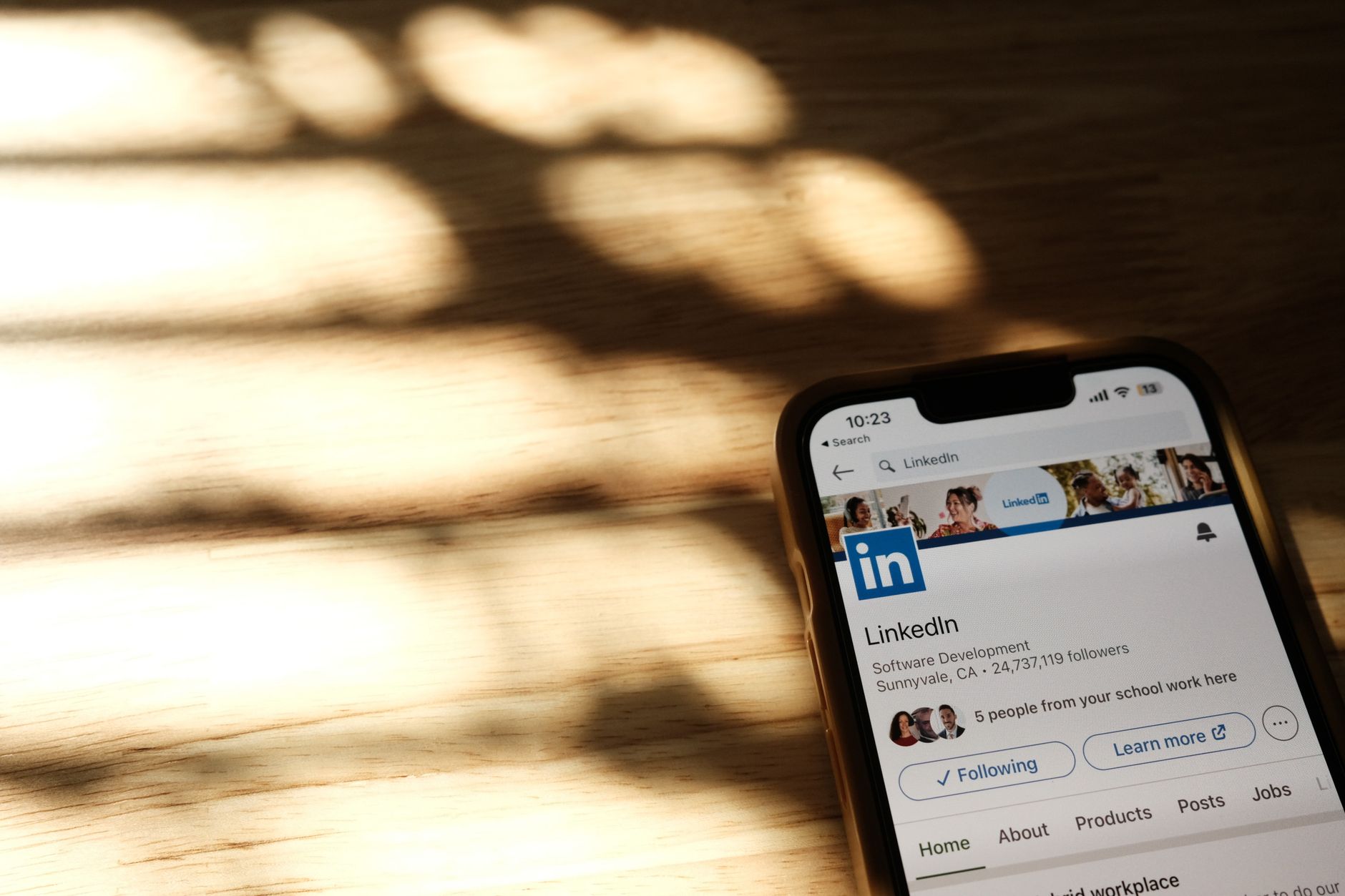 Close-up of a LinkedIn page open on a smartphone screen